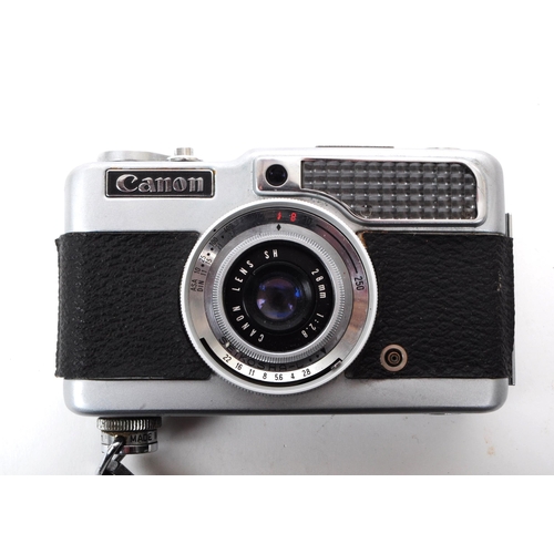 208 - Canon - A vintage mid 20th century circa 1960s Canon Demi half frame 35mm viewfinder camera. The cam... 