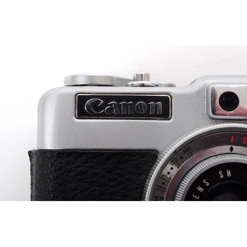 208 - Canon - A vintage mid 20th century circa 1960s Canon Demi half frame 35mm viewfinder camera. The cam... 