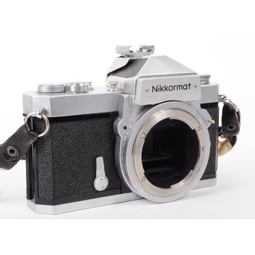 209 - Nikon - A collection of three vintage mid 20th century Nikon 35mm SLR camera bodies. The collection ... 