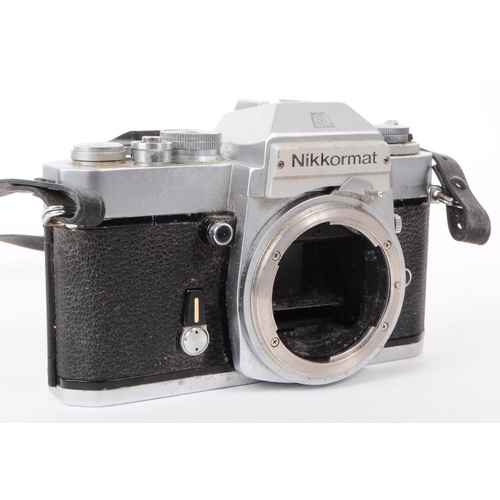 209 - Nikon - A collection of three vintage mid 20th century Nikon 35mm SLR camera bodies. The collection ... 