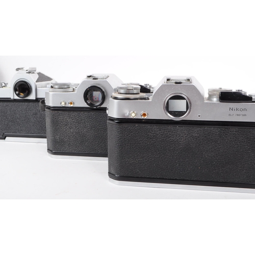 209 - Nikon - A collection of three vintage mid 20th century Nikon 35mm SLR camera bodies. The collection ... 