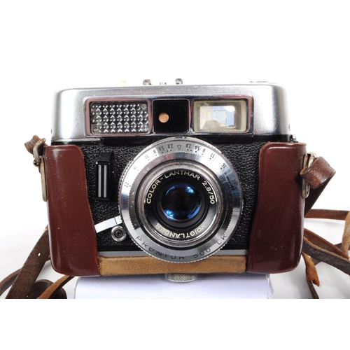 212 - A collection of mid 20th century German 35mm viewfinder and rangefinder cameras. The collection to i... 