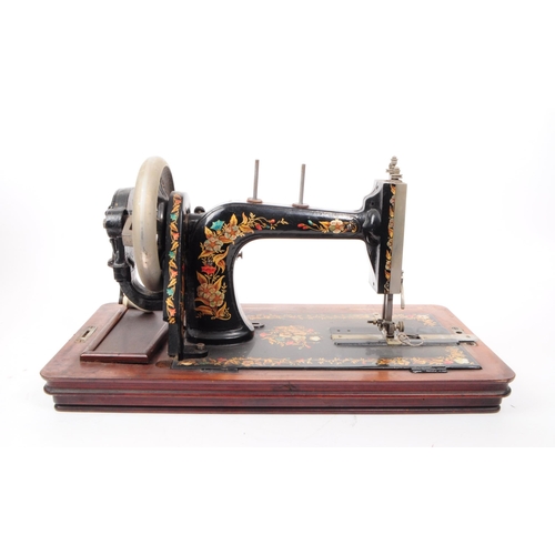 214 - A late 19th century German sewing machine in the manner of Clemens Muller. The sewing machine having... 