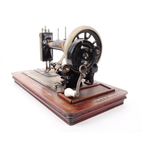 214 - A late 19th century German sewing machine in the manner of Clemens Muller. The sewing machine having... 