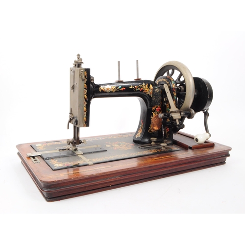 214 - A late 19th century German sewing machine in the manner of Clemens Muller. The sewing machine having... 