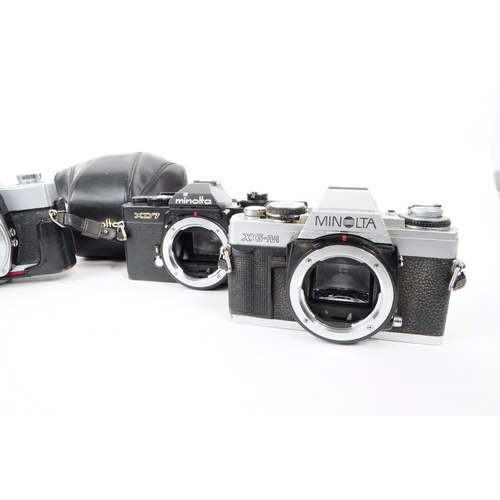 215 - Minolta - A collection of vintage 20th century Minolta 35mm SLR camera bodies. The collection of cam... 