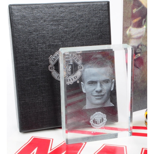 217 - Manchester United - A collection of Manchester United memorabilia to include two posters, pencil cas... 