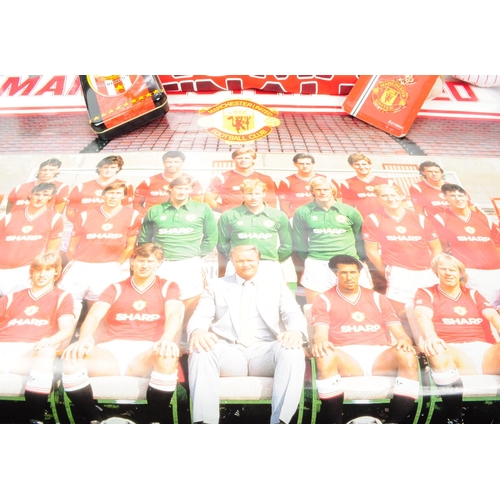 217 - Manchester United - A collection of Manchester United memorabilia to include two posters, pencil cas... 