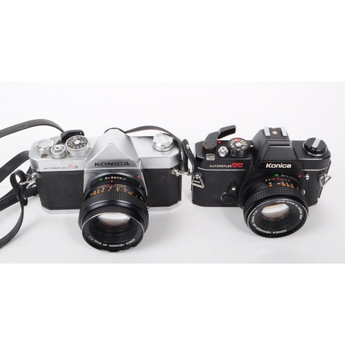 221 - Konica - Two vintage 20th century Konica AutoReflex 35mm SLR cameras with lenses. The collection to ... 