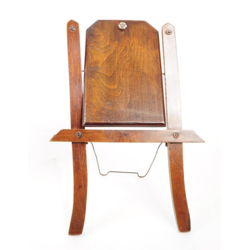 222 - An early 20th century table top art nouveau style mahogany picture frame and a small wooden easel. T... 