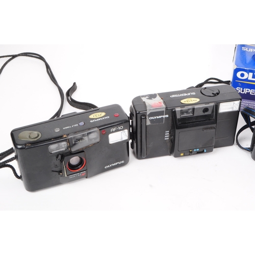 226 - Olympus - A collection of six late 20th century Olympus 35mm point and shoot film cameras. The colle... 