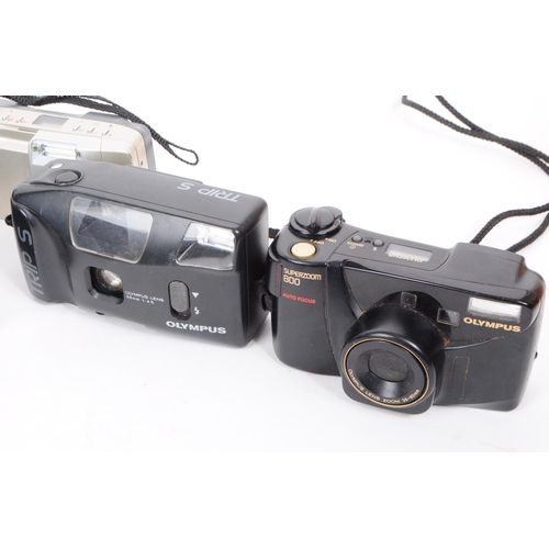 226 - Olympus - A collection of six late 20th century Olympus 35mm point and shoot film cameras. The colle... 