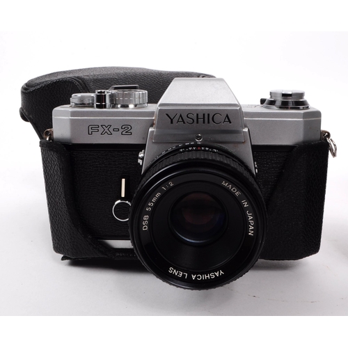 229 - Yashica - Two vintage 20th century 1960s and 1970s 35mm SLR cameras. The collection to include a Yas... 