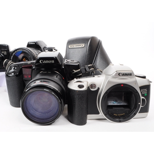 235 - A collection of six contemporary 1990s film cameras, comprised of two Canon EOS 10 cameras, a Canon ... 