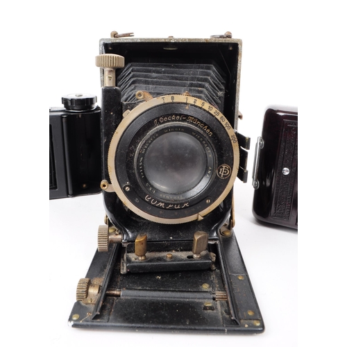 238 - Three early 20th century folding film cameras, comprised of a 1950s Kershaw eight-20 King Penguin ca... 