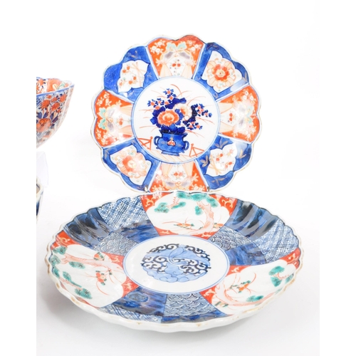 24 - A collection of vintage early 20th century Chinese imari plates and bowls, comprised of three bowls,... 