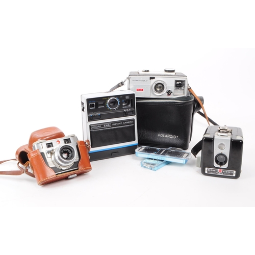 241 - A collection of four vintage Kodak cameras, comprised of a Brownie Hawkeye camera flash model, a Bro... 