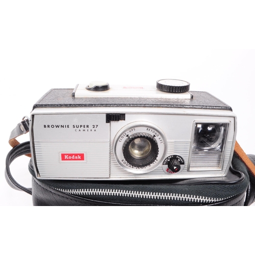 241 - A collection of four vintage Kodak cameras, comprised of a Brownie Hawkeye camera flash model, a Bro... 