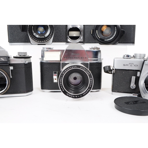 242 - A collection of vintage mid 20th century 35mm SLR cameras. The collection featuring six 35mm SLR cam... 