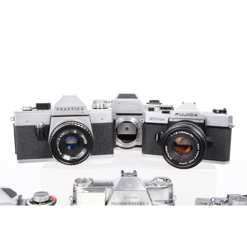 242 - A collection of vintage mid 20th century 35mm SLR cameras. The collection featuring six 35mm SLR cam... 