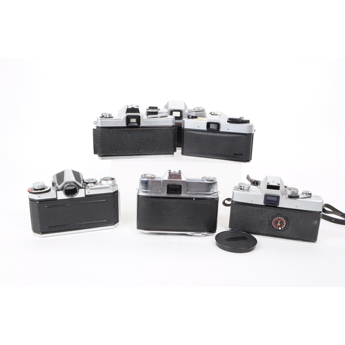 242 - A collection of vintage mid 20th century 35mm SLR cameras. The collection featuring six 35mm SLR cam... 