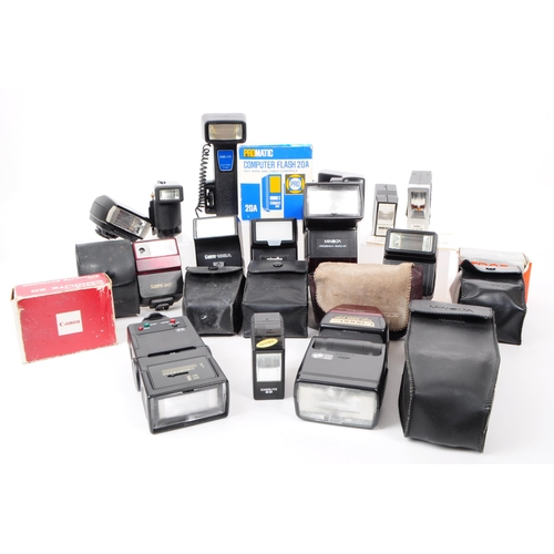 243 - A collection of vintage camera flash units, examples including a Kako Hi-Beam II, a Minolta auto 200... 