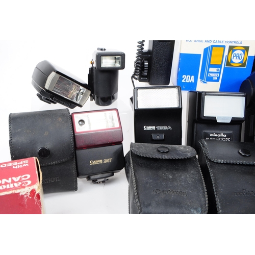 243 - A collection of vintage camera flash units, examples including a Kako Hi-Beam II, a Minolta auto 200... 