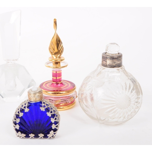 3 - A collection of 20th century assorted perfume bottles, compact case and carriage clock. Including cr... 