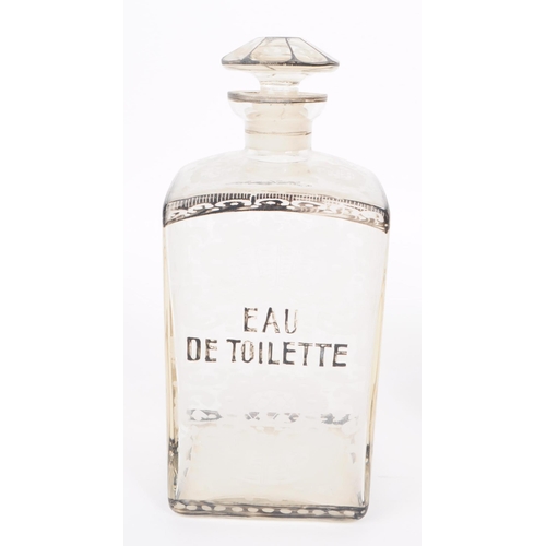 31 - Two late 19th century Victorian glass perfume cologne bottles, comprised of an 'Eau De Toilette' and... 