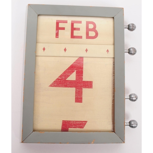 375 - GPO Perpetual Calendar. Wall mounted. Circa 1950s as used within the Post Office. Wood case in origi... 