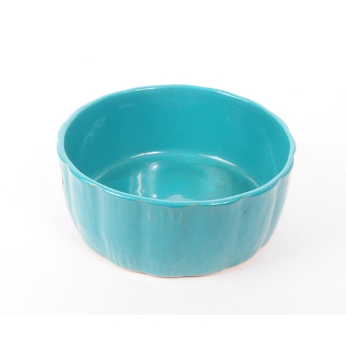 38 - T.G.Green & Co - Gresley Ware - A vintage late 20th century ceramic bowl in a turquoise glaze. C... 