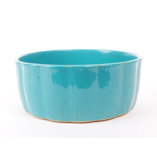 38 - T.G.Green & Co - Gresley Ware - A vintage late 20th century ceramic bowl in a turquoise glaze. C... 