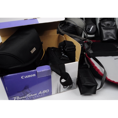 380 - Collection of late 20th / 21st century SLR cameras and accessories. Examples including a Canon EOS 4... 