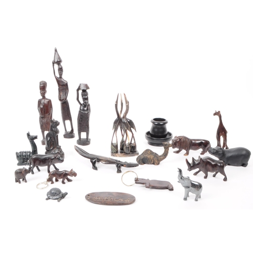 381 - Collection of 20th century carved hardwood / ebony African tribal figures of people and animals. Lar... 