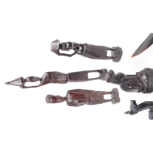 381 - Collection of 20th century carved hardwood / ebony African tribal figures of people and animals. Lar... 