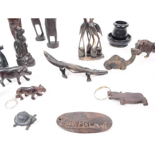 381 - Collection of 20th century carved hardwood / ebony African tribal figures of people and animals. Lar... 