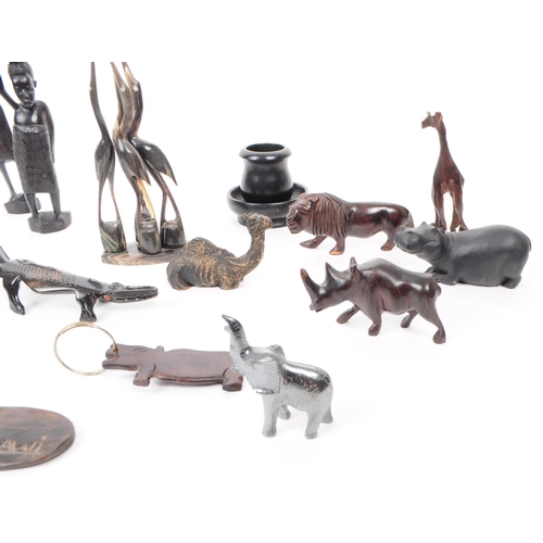 381 - Collection of 20th century carved hardwood / ebony African tribal figures of people and animals. Lar... 