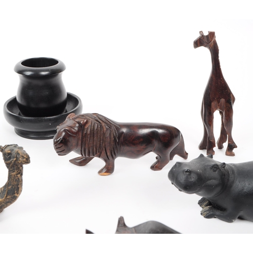 381 - Collection of 20th century carved hardwood / ebony African tribal figures of people and animals. Lar... 