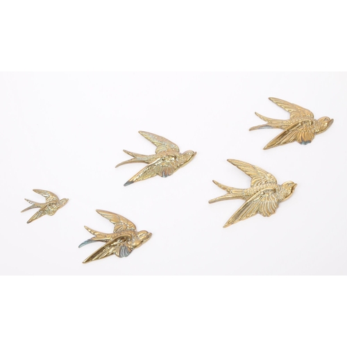 384 - A collection of vintage 20th century decorative brass swallow bird wall hangings. The collection to ... 