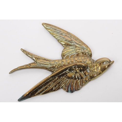 384 - A collection of vintage 20th century decorative brass swallow bird wall hangings. The collection to ... 