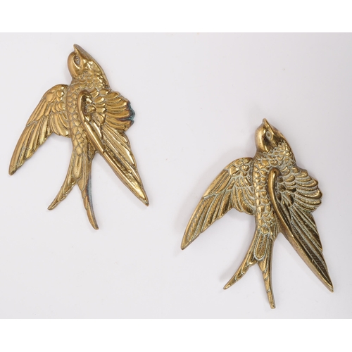 384 - A collection of vintage 20th century decorative brass swallow bird wall hangings. The collection to ... 