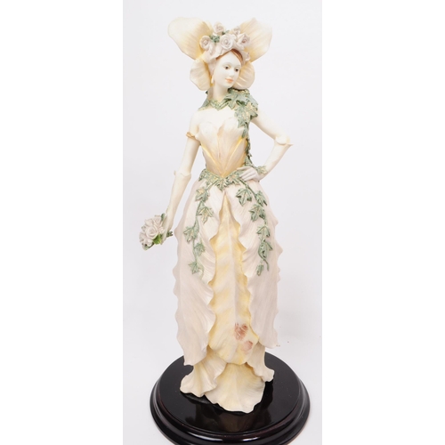 388 - The Leonardo Collection - A collection of three large resin Enchanted Garden flower fairy figurines.... 