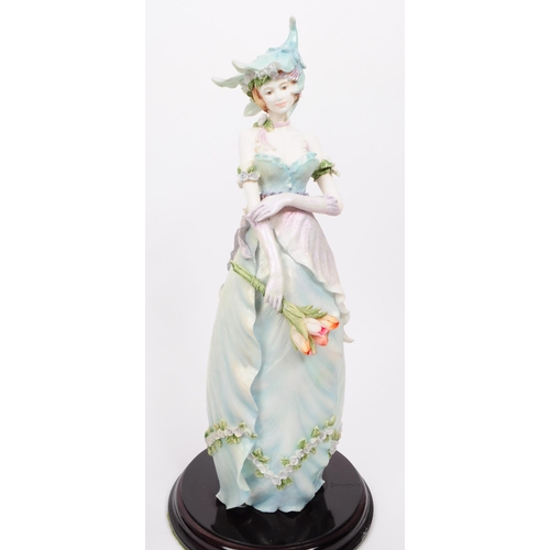 388 - The Leonardo Collection - A collection of three large resin Enchanted Garden flower fairy figurines.... 