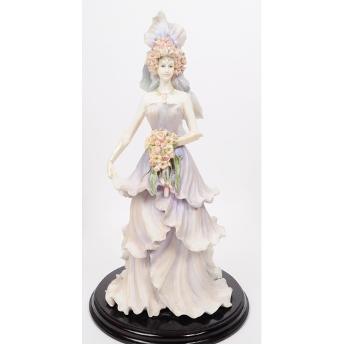 388 - The Leonardo Collection - A collection of three large resin Enchanted Garden flower fairy figurines.... 