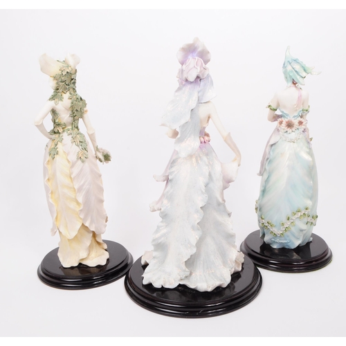 388 - The Leonardo Collection - A collection of three large resin Enchanted Garden flower fairy figurines.... 