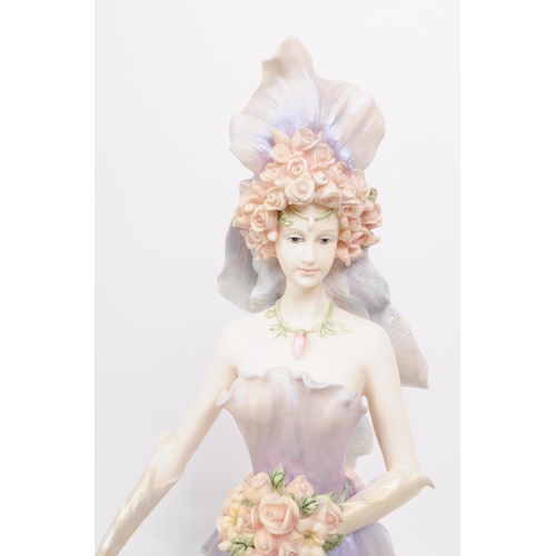 388 - The Leonardo Collection - A collection of three large resin Enchanted Garden flower fairy figurines.... 