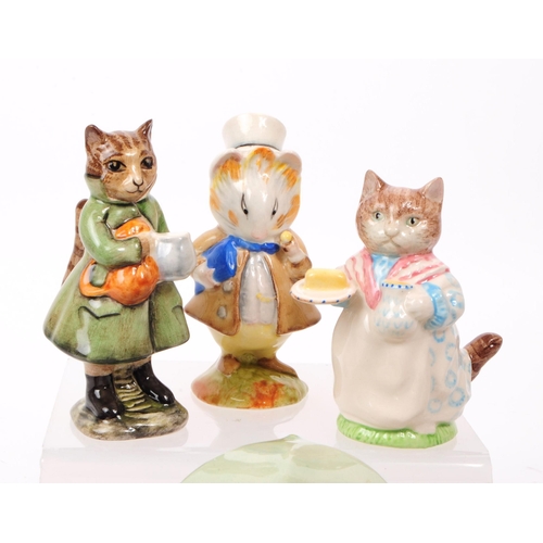 41 - Beswick - A collection of eight 20th century porcelain Beatrix Potter figures, including, 'Goody &am... 