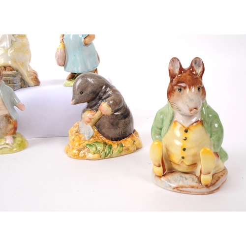 42 - Beswick - A collection of eight 20th century porcelain Beatrix Potter figures, 'Mrs Flopsy Bunny' (1... 