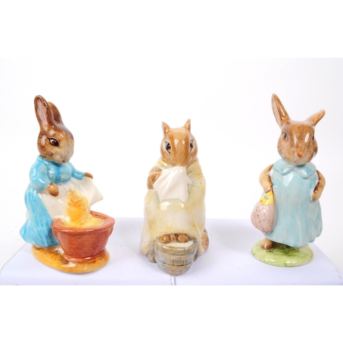 42 - Beswick - A collection of eight 20th century porcelain Beatrix Potter figures, 'Mrs Flopsy Bunny' (1... 