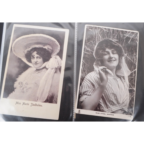 543 - A collection of Edwardian and early 20th century photographic portrait postcards. The collection fea... 